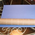 Roll with paper overlapping on one end.